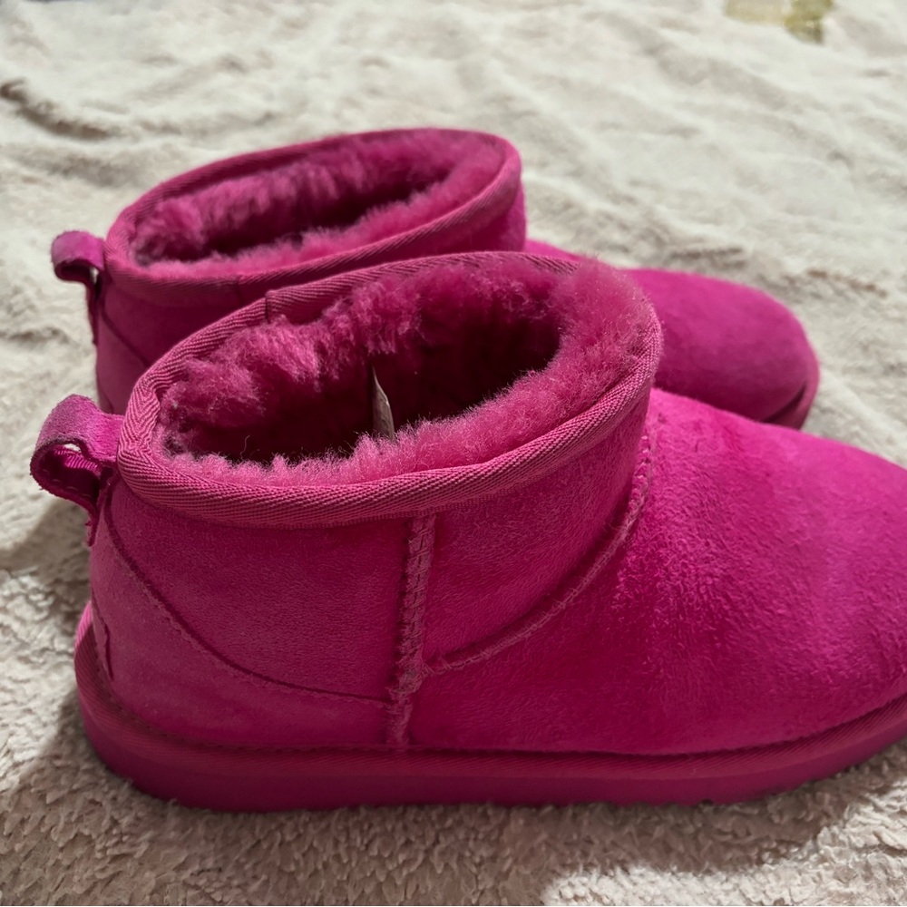 Vibrant Pink Ugg’s ankle Boots with Soft Suede Texture and Plush Lining